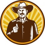 Cowboy Thumbs Up Sunburst Circle Woodcut Stock Photo