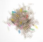 Pile Of Metal Paperclips Isolated Stock Photo