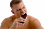 Muscular Guy Eating Chocolate Stock Photo