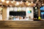 Selected Focus Empty Brown Wooden Table And Coffee Shop Or Resta Stock Photo