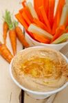 Fresh Hummus Dip With Raw Carrot And Celery Stock Photo