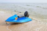 Old Scooter On Sea Beach Stock Photo