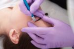 A Woman Getting Permanent Make Up Stock Photo