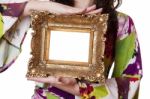 Woman Holding An Picture Frame Stock Photo