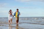 Couple At Beach Stock Photo