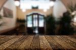 Selected Focus Empty Brown Wooden Table And Coffee Shop Or Resta Stock Photo