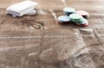 Cards And Poker Chips On Wooden Background Stock Photo