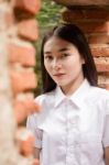 Thai Adult Student University Uniform Beautiful Girl Relax And Smile Stock Photo