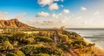 Diamond Head And Queen's Surf Beach In Honolulu, Hawaii Stock Photo