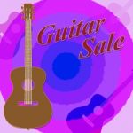 Guitar Sale Indicates Save Discounts And Promo Stock Photo