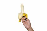 Hand Holding Banana Stock Photo