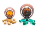 Pills Capsule Spilling Stock Photo