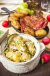 Potato Salad And Bacon Rib With Roasted Potatoes. Farmhouse Styl Stock Photo