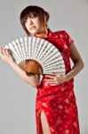 Chinese Model In Traditional Cheongsam Dress Stock Photo