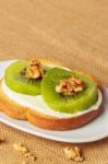 Toast With Kiwi, Cheese And Walnuts Stock Photo