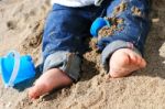 Baby On The Beach Stock Photo