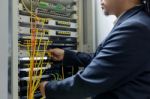 People Fix Node Fiber Optic In Network Room Stock Photo