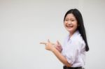 Portrait Of Thai High School Student Uniform Beautiful Girl Pointing Stock Photo