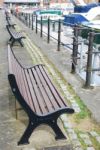 Empty Benchs At The Docks Stock Photo