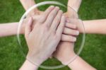 Hands Arms Uniting In Glass Sphere Stock Photo