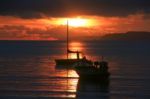 Sunrise And Boat Stock Photo