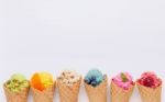 Various Of Ice Cream Flavor In Cones Blueberry ,strawberry ,pist Stock Photo