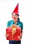 Woman Smile And Hold Gift Box In Hands Stock Photo