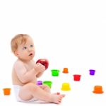 Cute Infant Boy With Apple Stock Photo