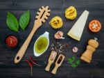 The  Pasta On Black Wooden Background. Yellow Italian Pasta With Stock Photo