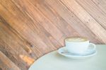 White Cup Of Coffee Latte On Wooden Backgound Stock Photo