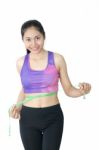 Woman In Sport Bra Measuring Her Body With Tape Isolated On Whit Stock Photo