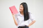 Asia Thai High School Student Uniform Beautiful Girl Read A Book Stock Photo