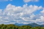 Beautiful Clouds With Mountains Stock Photo