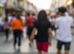 Blurred People Walking On The Street Of Old Town Stock Photo