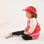 Little Girl Fashion Model With Red Cap Stock Photo