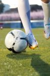 Shoot Of Football Player On The Outdoors Field Stock Photo