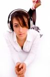 Front View Of Fashionable Female Enjoying Music Stock Photo