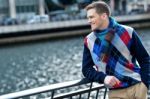 Stylish Young Man Watching The River Stock Photo