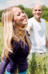 Young Couple Enjoying Themselves Stock Photo