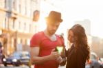 Happy Young Couple Texting Stock Photo