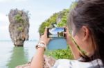 Women Tourist Shooting Natural View By Mobile Phone Stock Photo