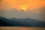 Sunset Over A Mountain At Lake Stock Photo