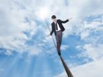 Businessman Walking On Rope Stock Photo