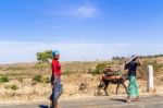 Ethiopian Woman Walking On The Road Stock Photo