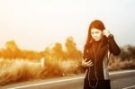 Woman Exercising Outdoor At Sunset  Stock Photo