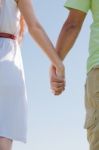 Young Couple Holding Hands Stock Photo