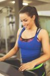 Woman Running On Treadmill Stock Photo