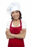 Asian Female Chef With Crossed Arms Stock Photo