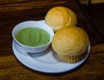 Stream Bread Dipping With Egg Custard Stock Photo