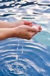 Human Hands With Water Drop Stock Photo